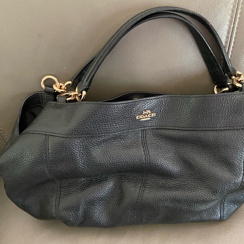 Black leather coach handbag Slouchy style,
